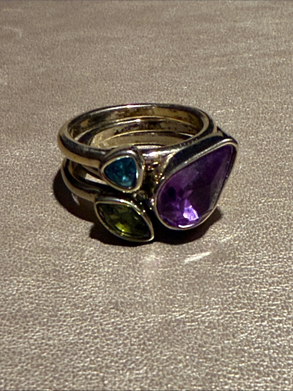Gold-toned Stackable Rings with Purple Teardrop and Blue-Green Accent Stones